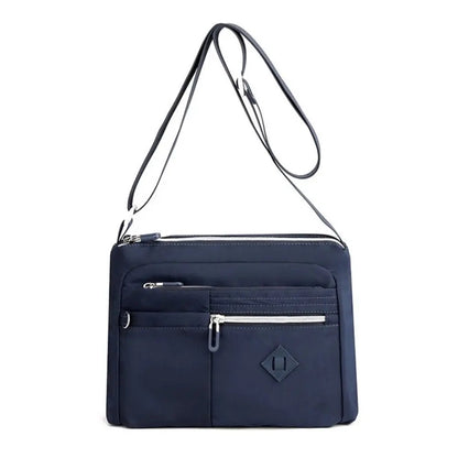 Eleganza™ - Cartera de mano multifuncional