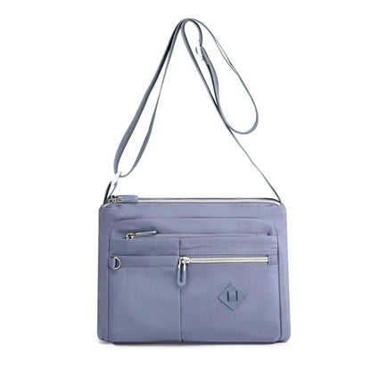 Eleganza™ - Cartera de mano multifuncional