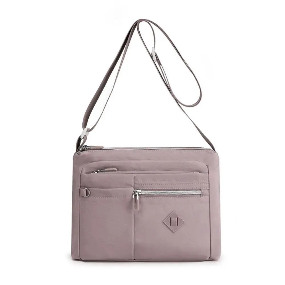 Eleganza™ - Cartera de mano multifuncional