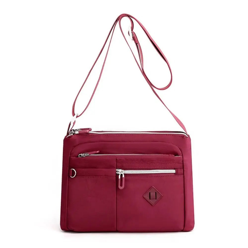 Eleganza™ - Cartera de mano multifuncional